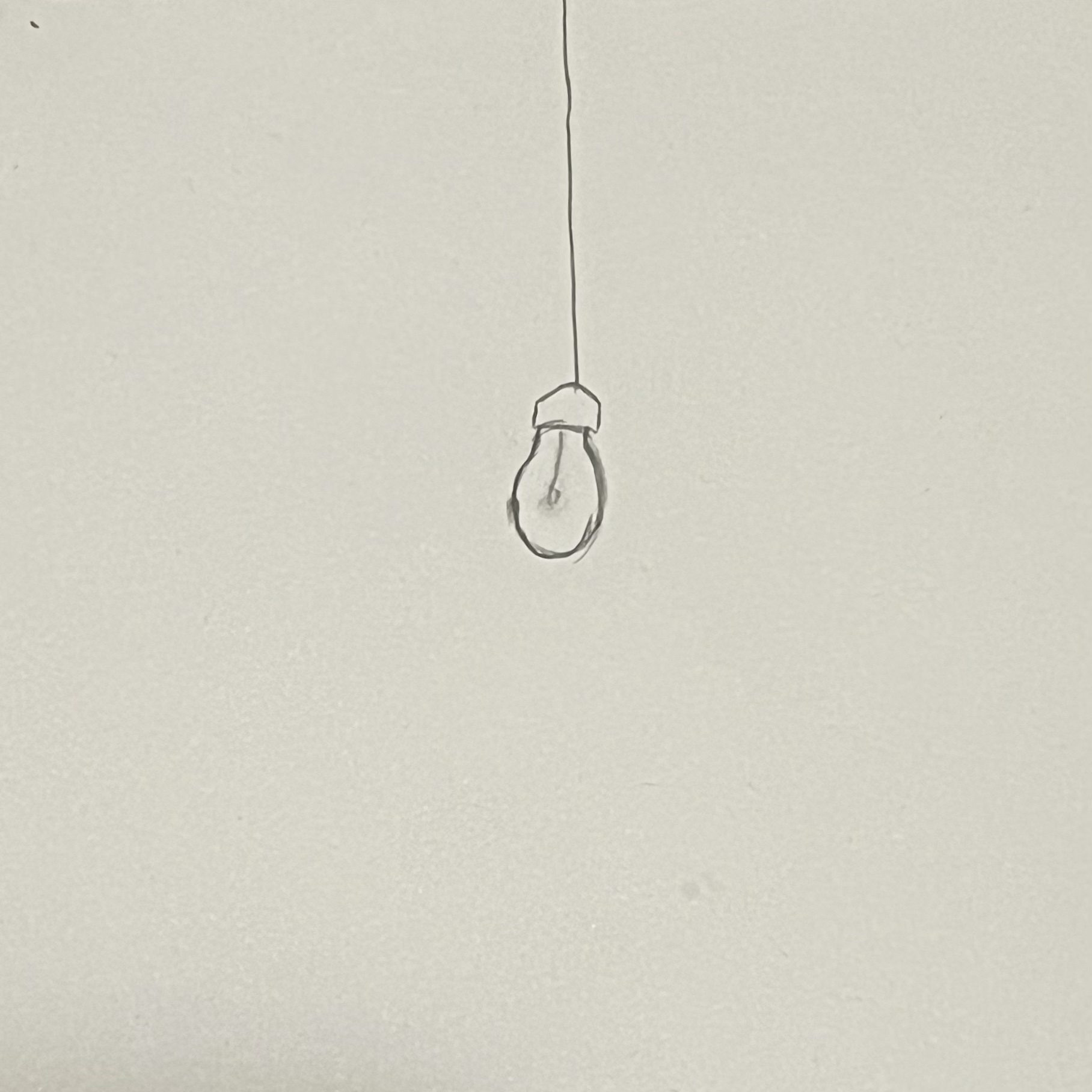 Lightbulb drawn on a piece of paper