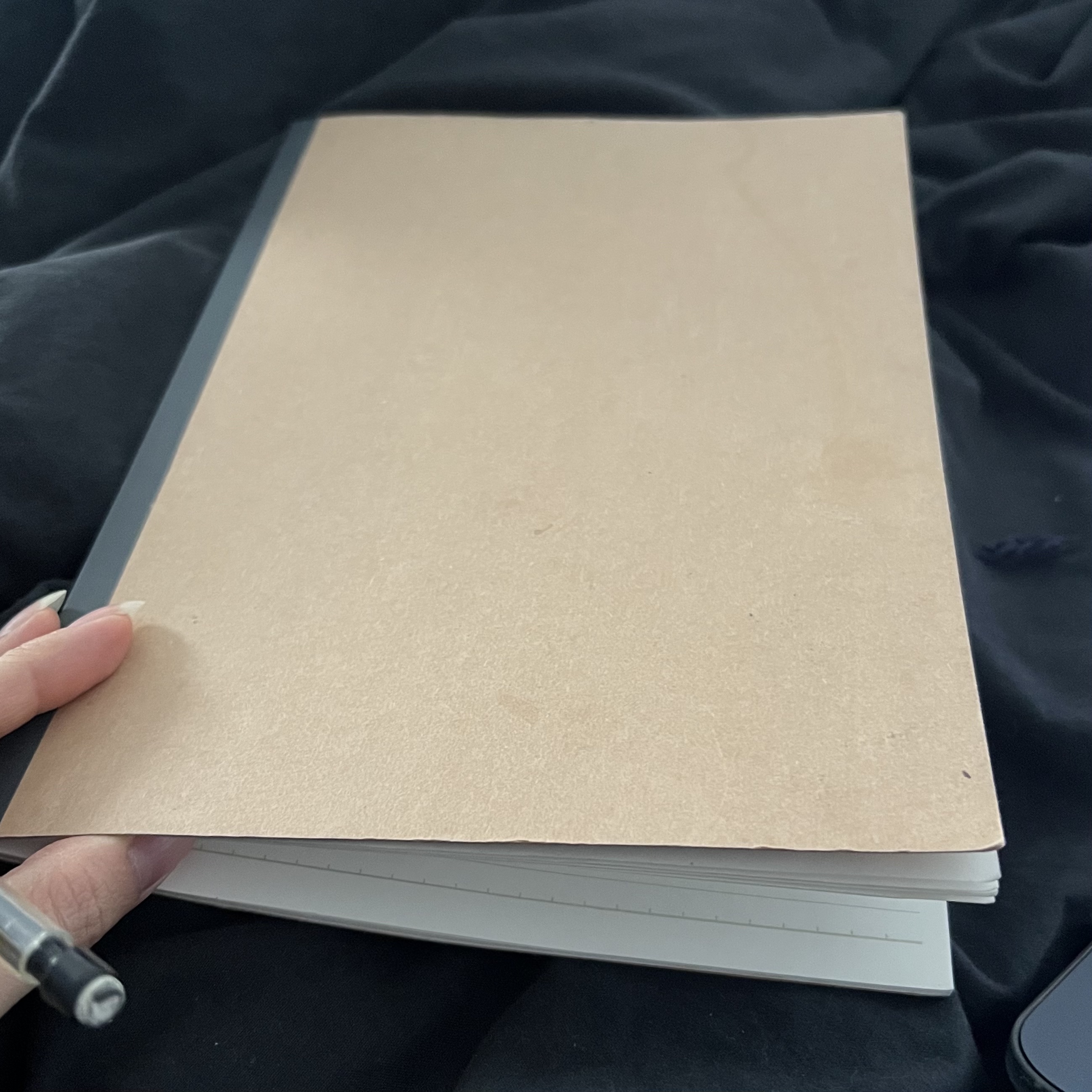 Notebook pictured as an affordance