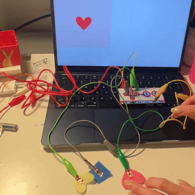 Each button is hooked to a different alligator clip and connected to multiple arrow keys