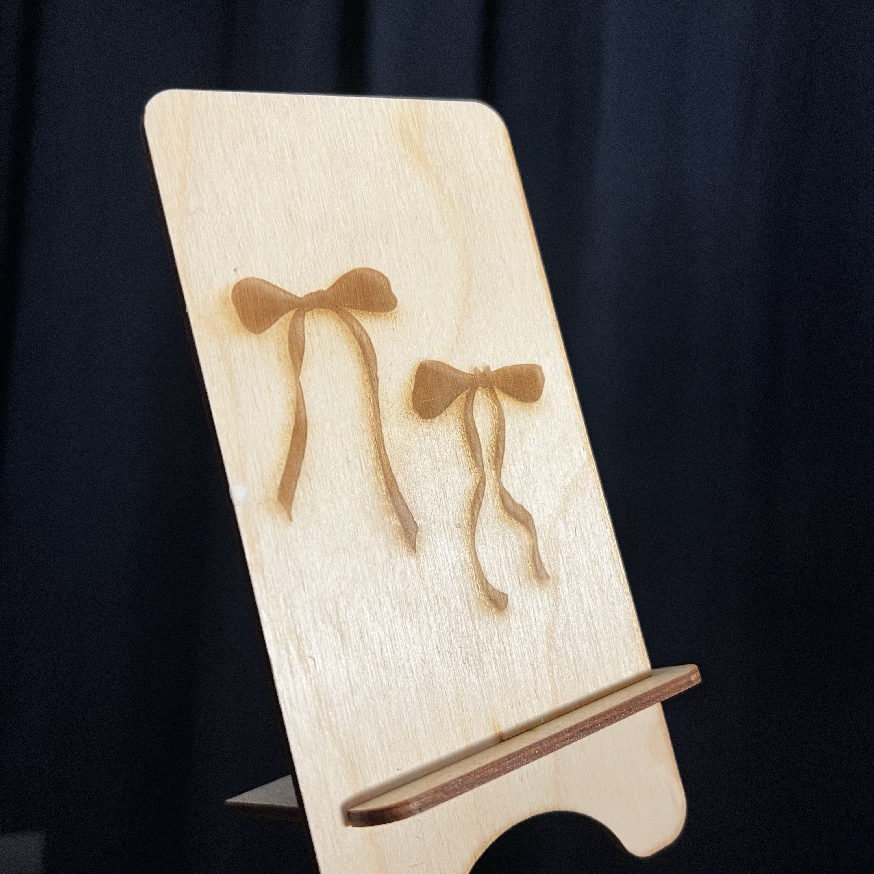 Finished laser cut print phone stand